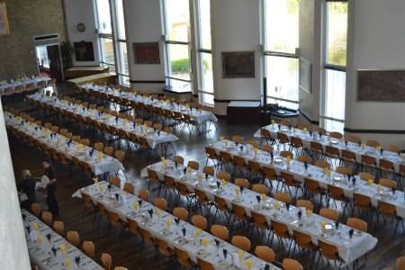 College dining hall set for a formal